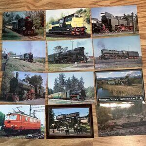 Post Cards Lot of 12 vintage Postcards of Train Engines Most out of Country